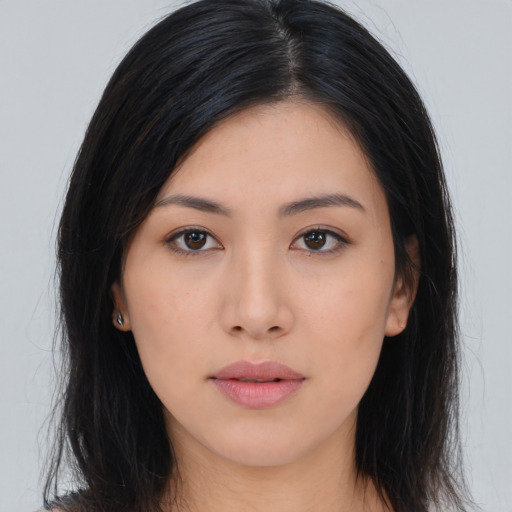 Neutral asian young-adult female with long  brown hair and brown eyes