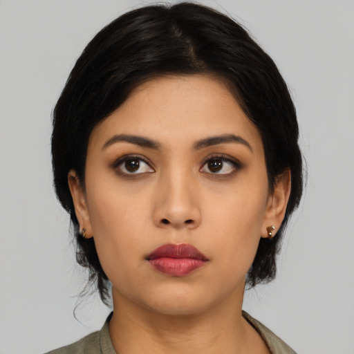 Neutral asian young-adult female with medium  black hair and brown eyes