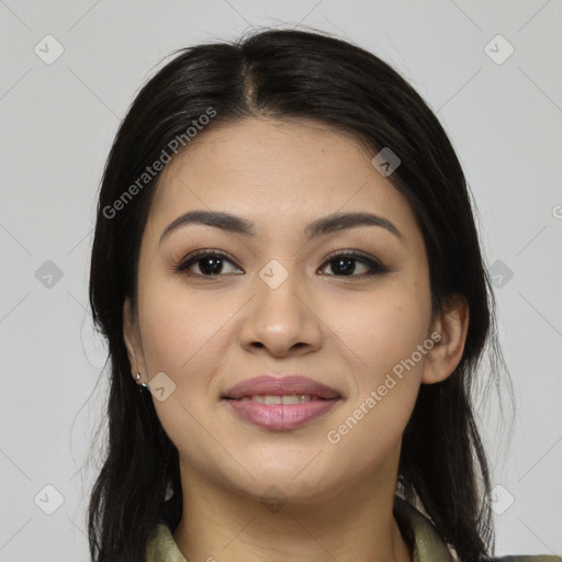 Joyful asian young-adult female with long  brown hair and brown eyes