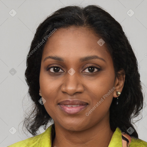 Joyful black young-adult female with medium  brown hair and brown eyes