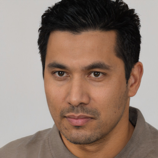 Neutral asian young-adult male with short  black hair and brown eyes