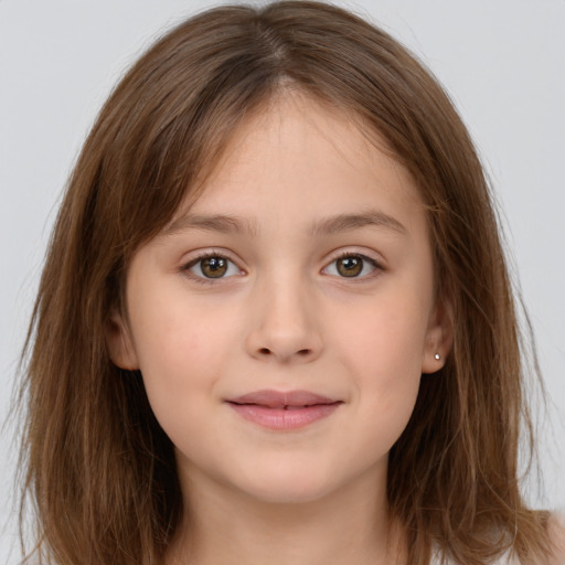 Joyful white child female with long  brown hair and brown eyes