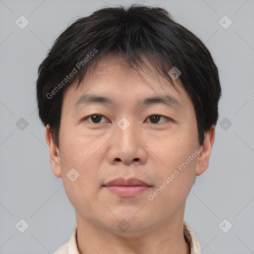 Neutral asian adult male with short  brown hair and brown eyes