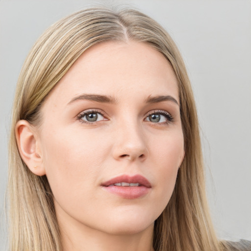 Neutral white young-adult female with long  brown hair and brown eyes