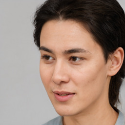 Joyful white young-adult male with medium  brown hair and brown eyes