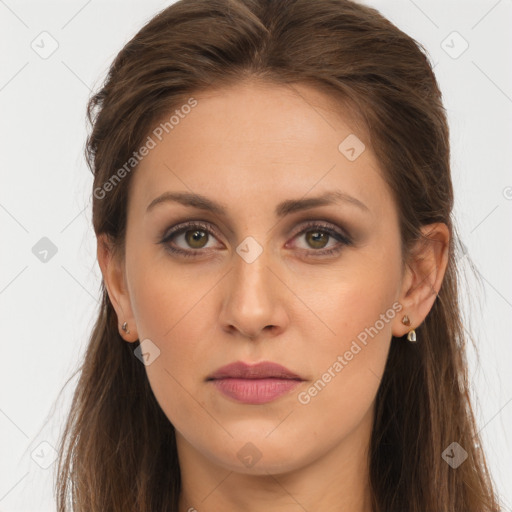 Joyful white young-adult female with long  brown hair and brown eyes