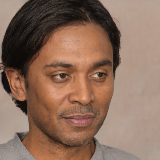 Neutral black adult male with short  brown hair and brown eyes