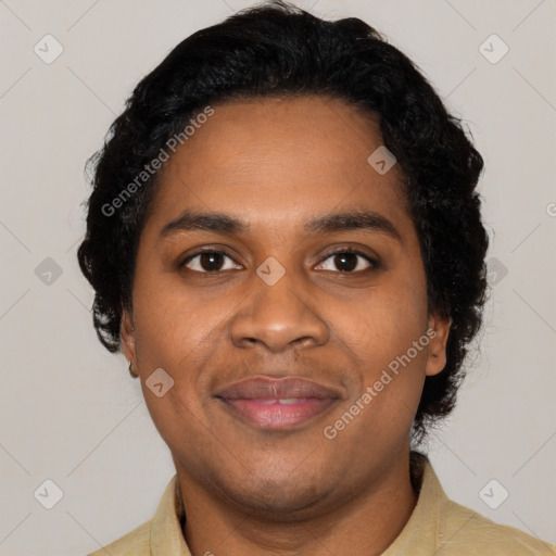 Joyful black young-adult male with short  black hair and brown eyes