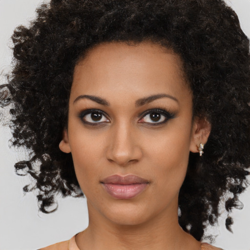 Neutral black young-adult female with medium  black hair and brown eyes