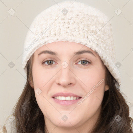 Joyful white young-adult female with long  black hair and brown eyes