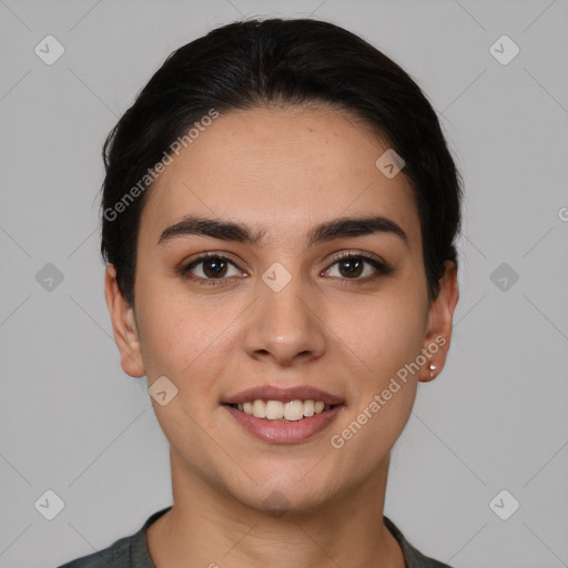 Joyful white young-adult female with short  brown hair and brown eyes