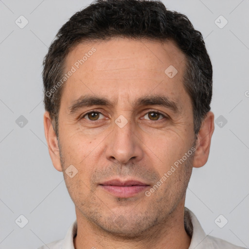 Neutral white adult male with short  brown hair and brown eyes