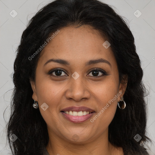 Joyful latino adult female with long  brown hair and brown eyes