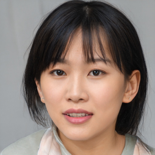 Neutral asian young-adult female with medium  brown hair and brown eyes