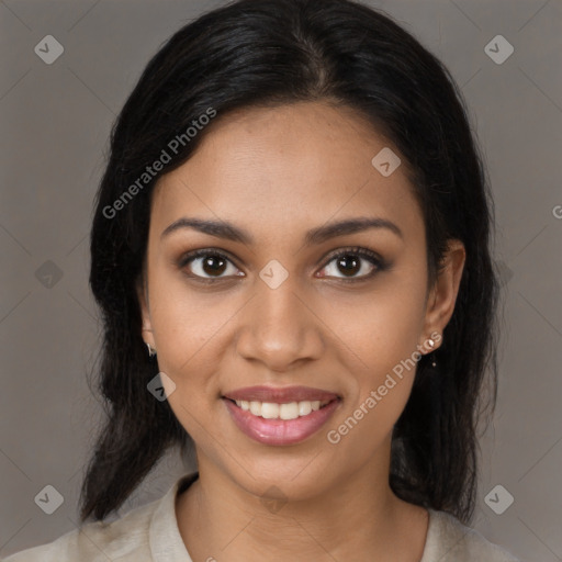 Joyful black young-adult female with medium  brown hair and brown eyes