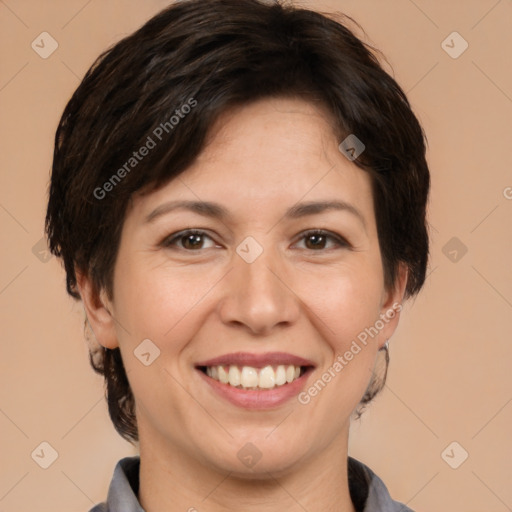 Joyful white adult female with short  brown hair and brown eyes