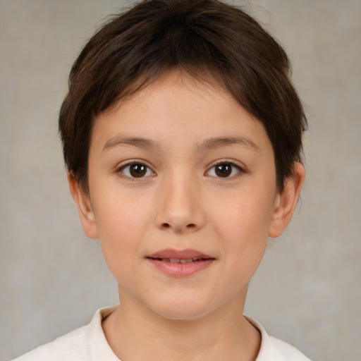 Joyful white child female with short  brown hair and brown eyes