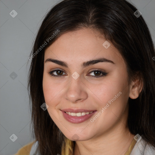 Joyful white young-adult female with medium  brown hair and brown eyes