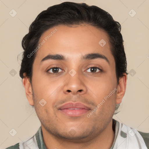 Joyful latino young-adult male with short  brown hair and brown eyes