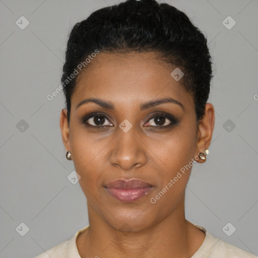 Joyful black young-adult female with short  black hair and brown eyes