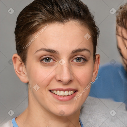 Joyful white young-adult female with short  brown hair and brown eyes