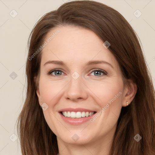 Joyful white young-adult female with long  brown hair and grey eyes