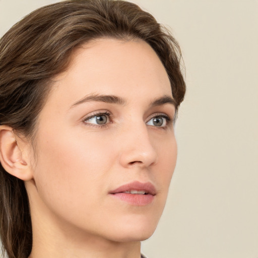 Neutral white young-adult female with medium  brown hair and grey eyes