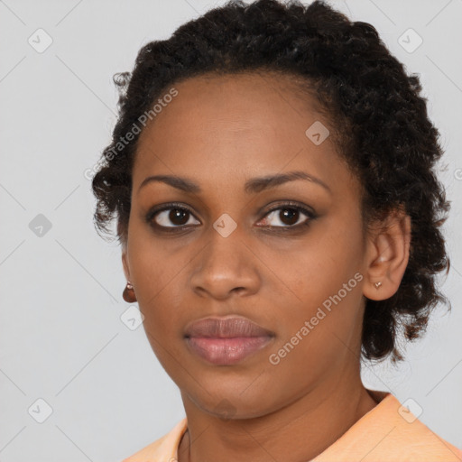 Neutral black young-adult female with medium  brown hair and brown eyes