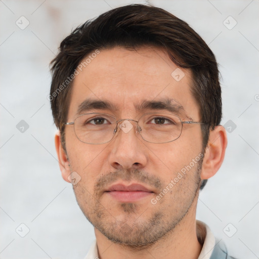 Joyful white adult male with short  brown hair and brown eyes