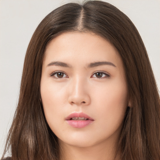 Neutral asian young-adult female with long  brown hair and brown eyes