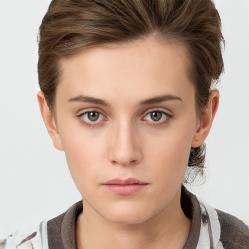 Neutral white young-adult female with short  brown hair and brown eyes