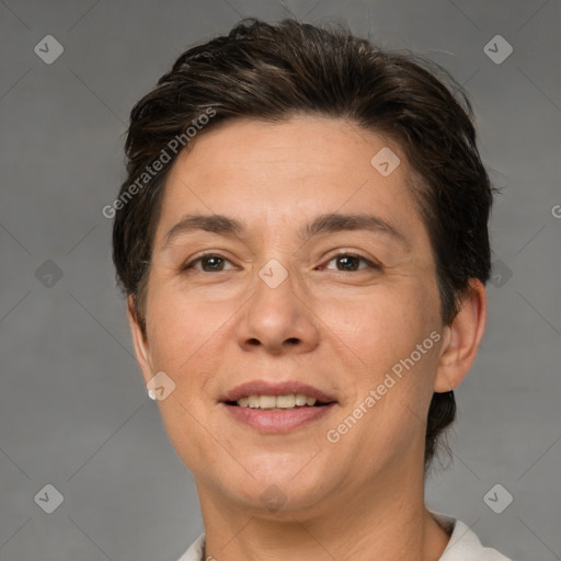 Joyful white adult female with short  brown hair and brown eyes