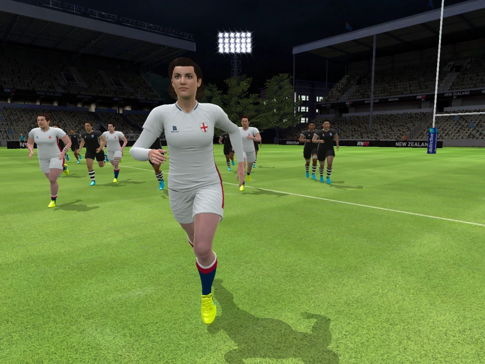 Rugby player in white England jersey running on field during video game match against New Zealand team