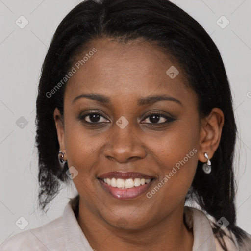 Joyful black young-adult female with medium  brown hair and brown eyes