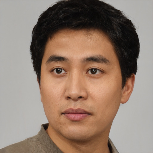 Neutral asian young-adult male with short  black hair and brown eyes