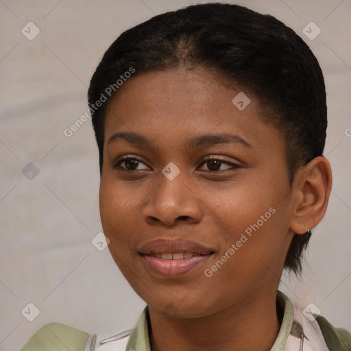 Joyful black young-adult female with short  brown hair and brown eyes