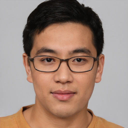 Neutral asian young-adult male with short  brown hair and brown eyes