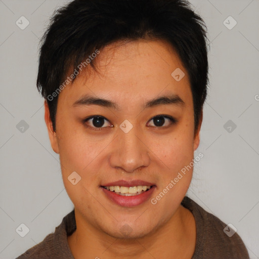Joyful asian young-adult female with short  brown hair and brown eyes