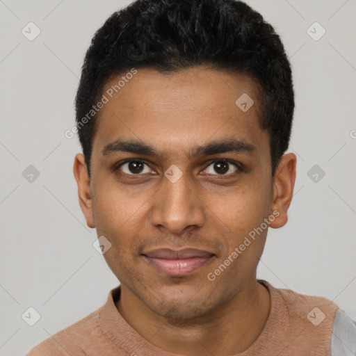 Joyful black young-adult male with short  black hair and brown eyes