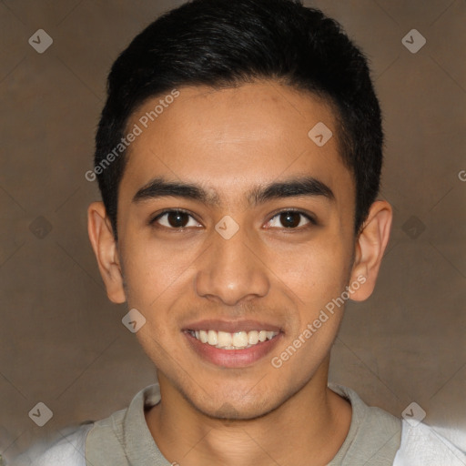 Joyful latino young-adult male with short  black hair and brown eyes