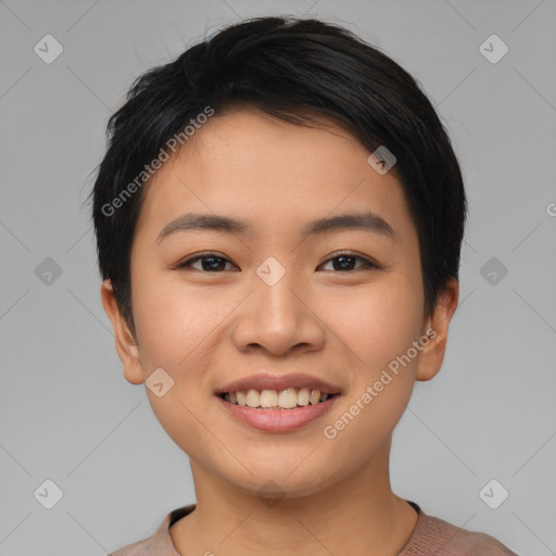 Joyful asian young-adult female with short  black hair and brown eyes