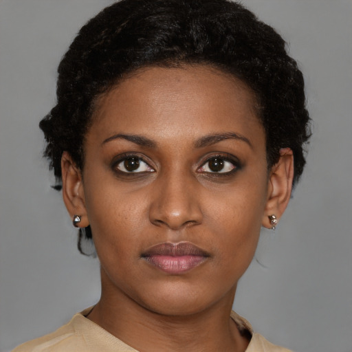 Neutral latino young-adult female with short  brown hair and brown eyes