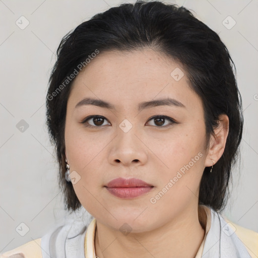 Joyful latino young-adult female with medium  black hair and brown eyes