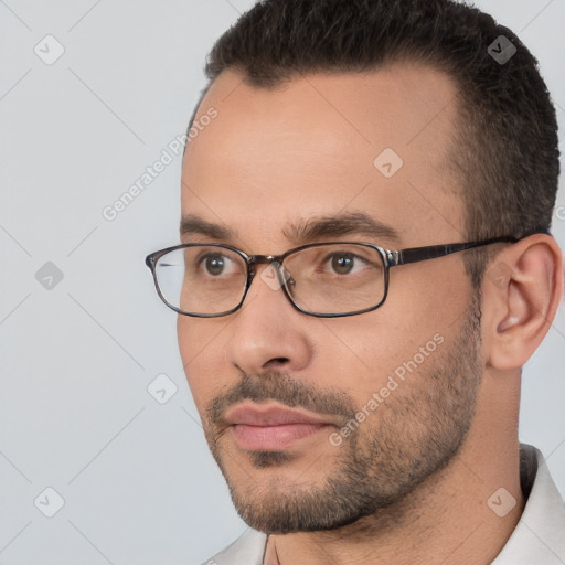 Neutral white young-adult male with short  brown hair and brown eyes