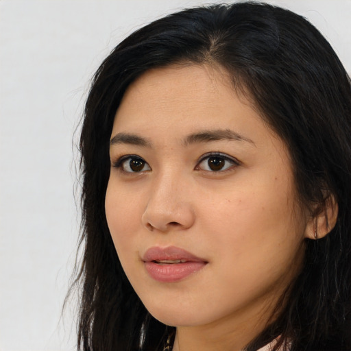 Neutral asian young-adult female with long  brown hair and brown eyes