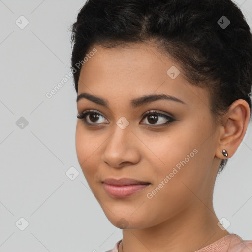 Joyful latino young-adult female with short  brown hair and brown eyes