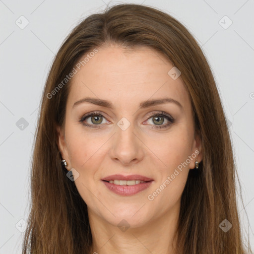 Joyful white young-adult female with long  brown hair and green eyes