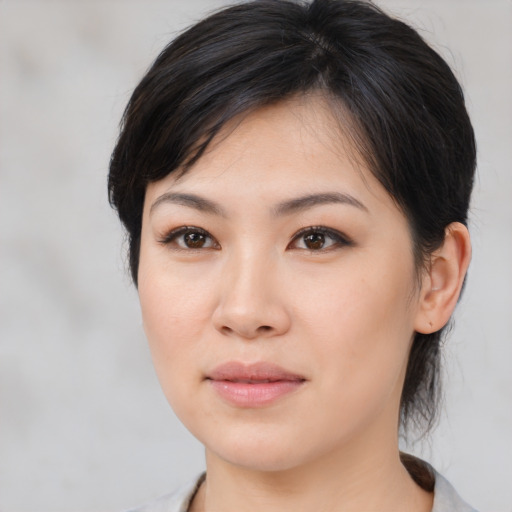 Neutral asian young-adult female with medium  brown hair and brown eyes