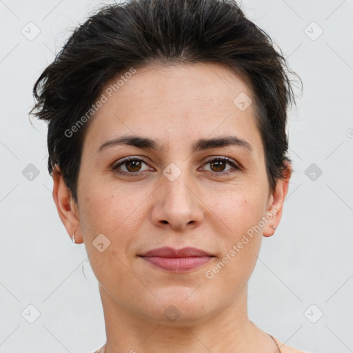 Joyful white adult female with short  brown hair and brown eyes