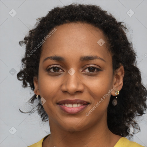 Joyful black young-adult female with medium  brown hair and brown eyes